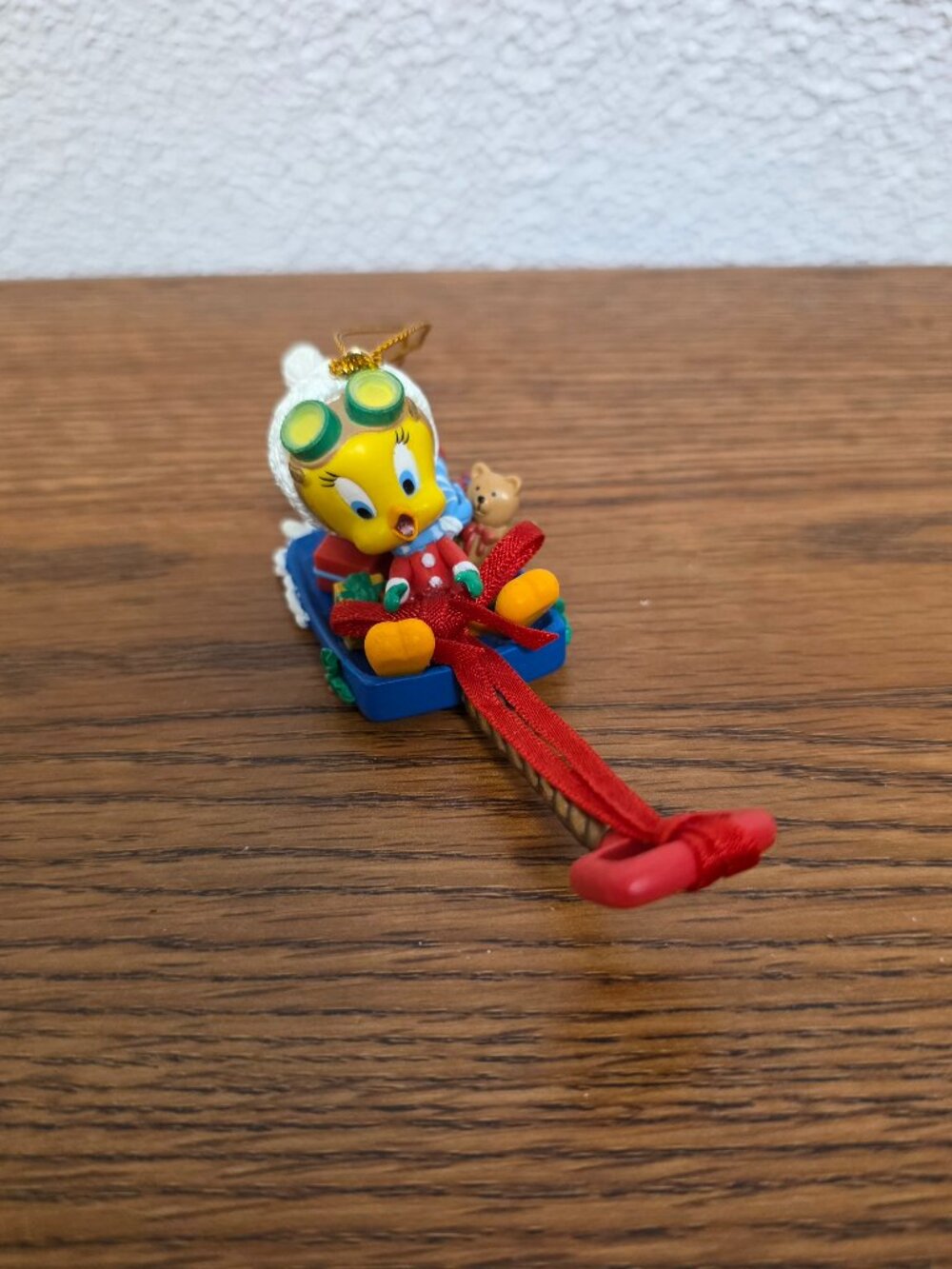Vintage Seasonal Decor Christmas Looney Tune Ornament Tweety on Sled 4.25"x1.5"